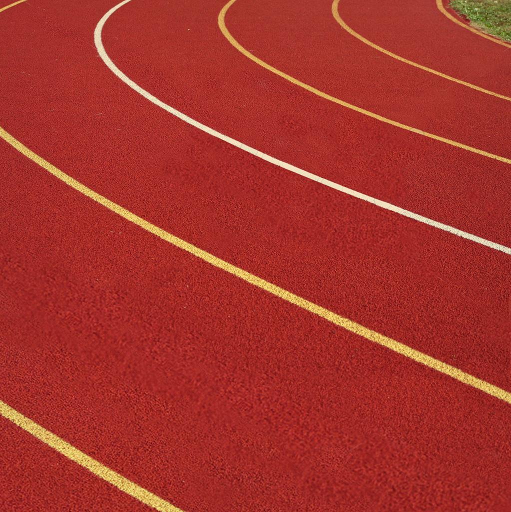 户外红色的塑胶跑道背景图片