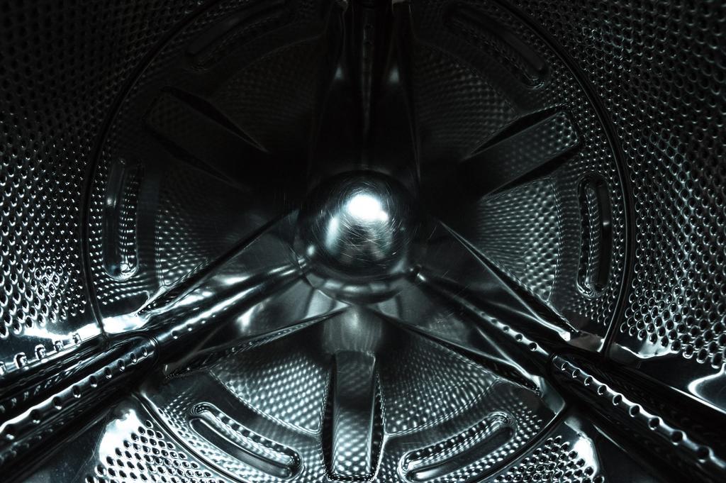 黑银机械经典洗衣机内部近照电子产品洗衣机背景图片