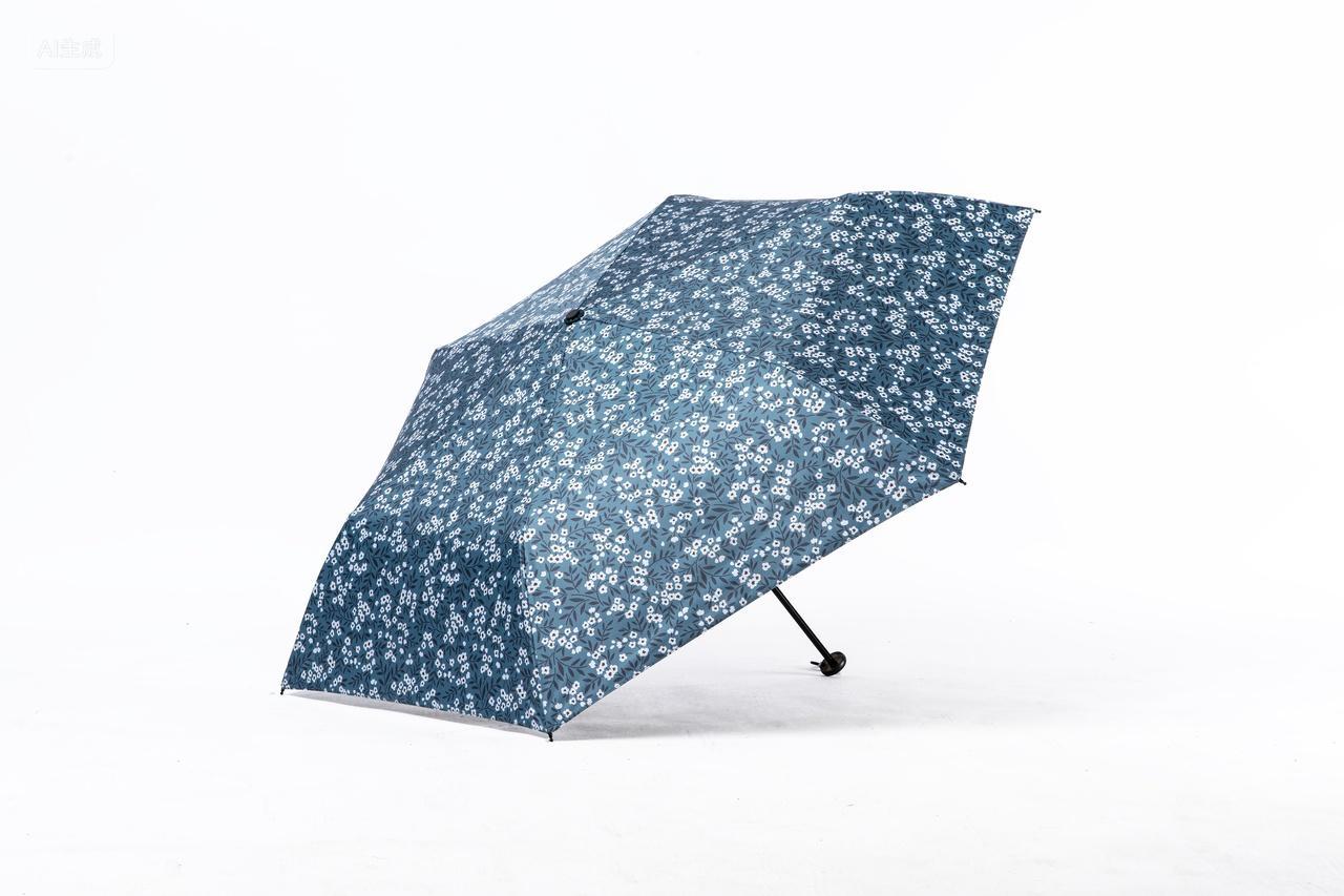 缩骨遮雨伞时尚伞形花纹设计图案雨伞展开的图片