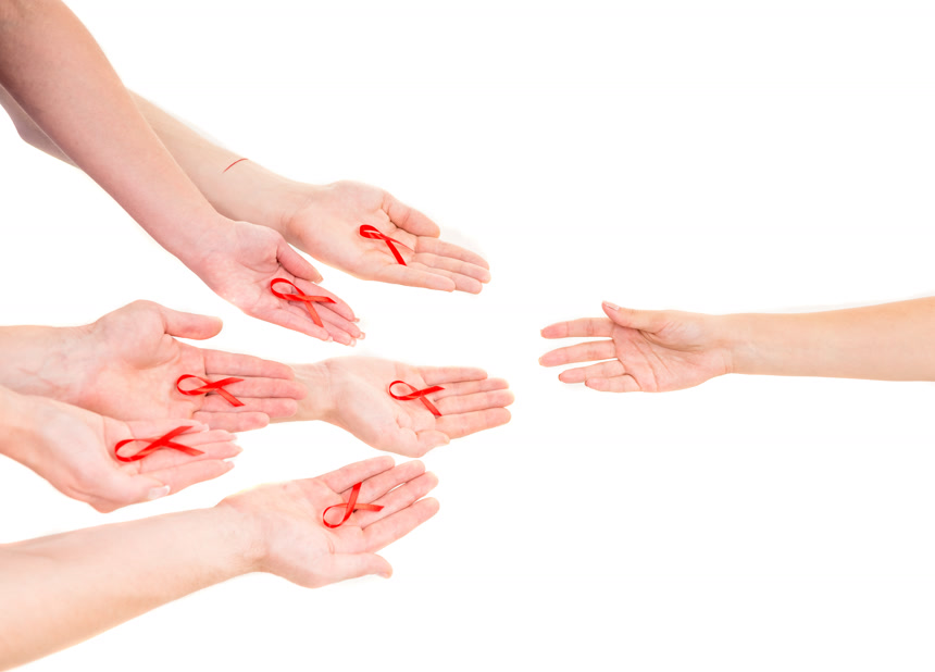 白底图上手拿拿着红丝带拒绝艾滋病宣传