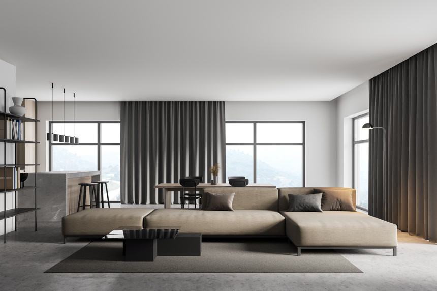 干净的客厅灰色沙发黑色的茶几室内设计