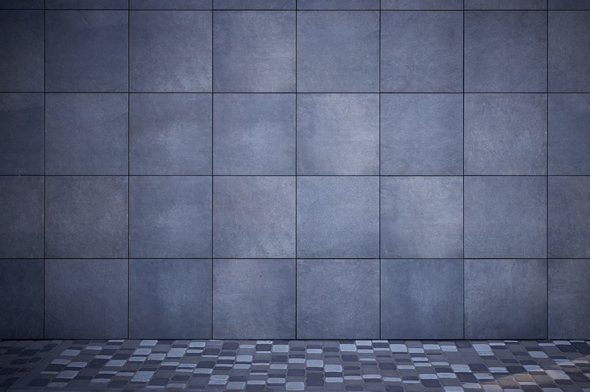 深灰色瓷砖的背景摘要