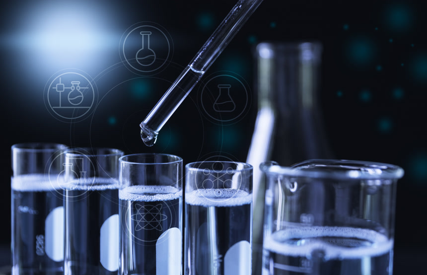 实验室有一个大光斑右侧有几个玻璃器皿里面装着液体