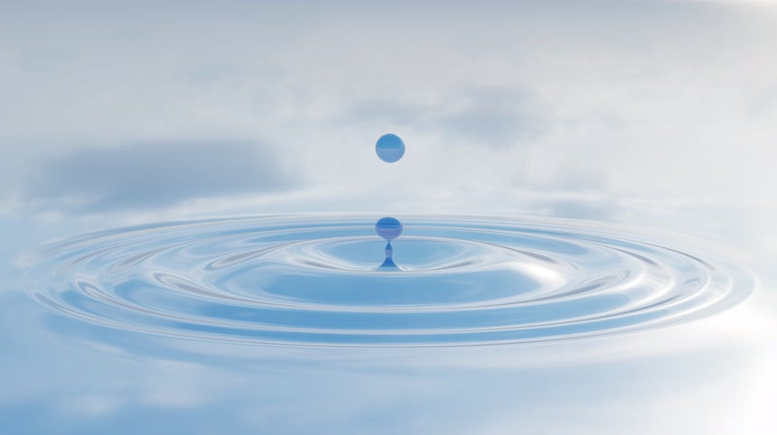 蓝色液体滴落水中泛起波纹素材