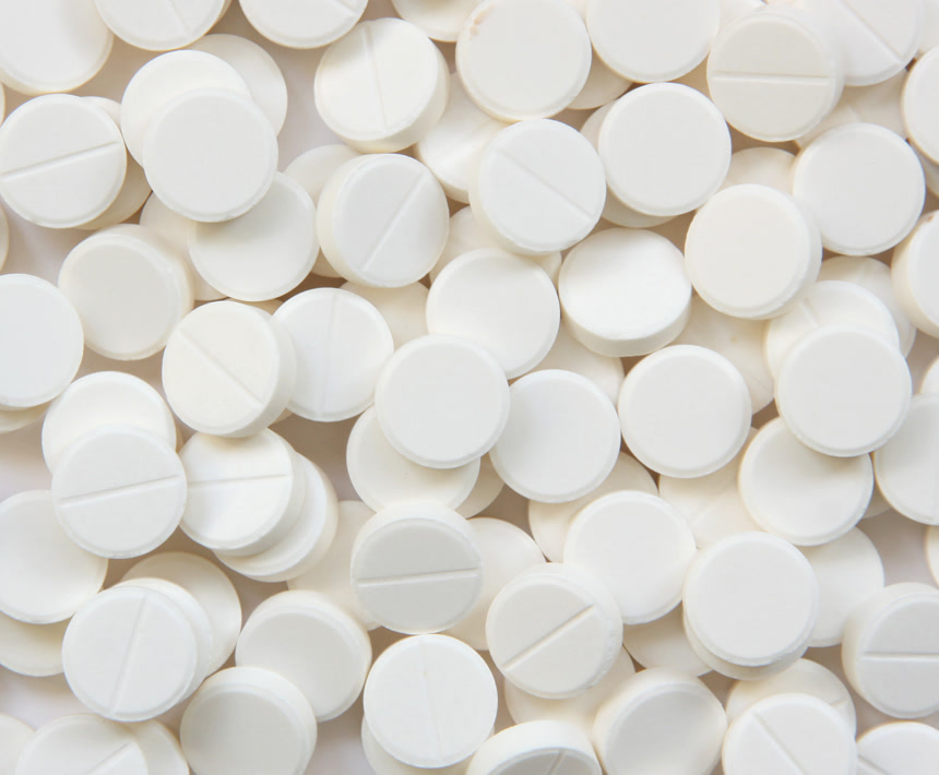 白色药片堆叠，医疗保健必备