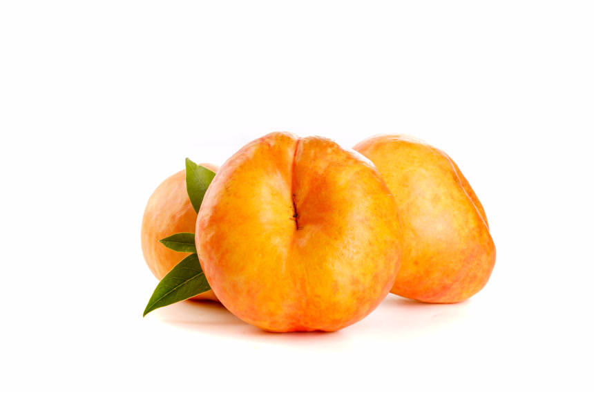 白底摆放着黄油蟠桃