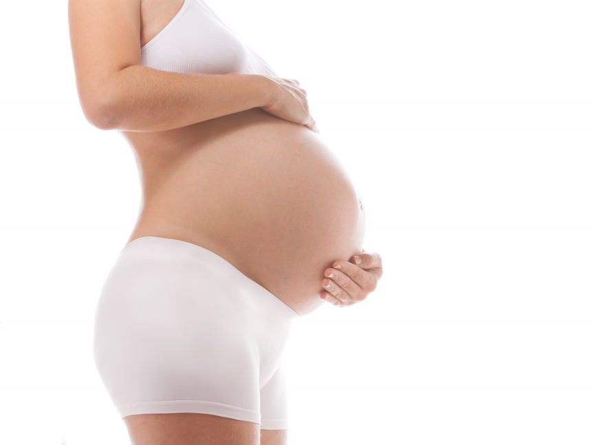 白底图孕妇触摸腹部孕妈妈准妈妈大肚子孕妇照