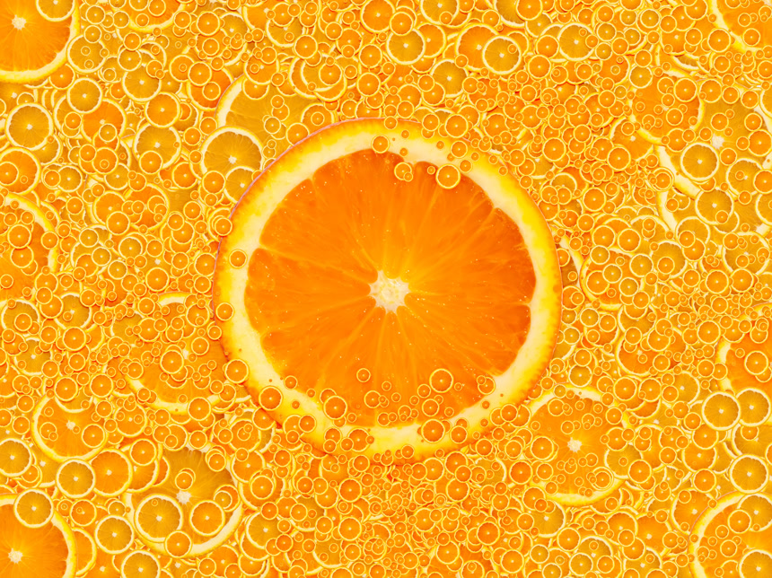 多汁的橙子橙色背景图水果店宣传