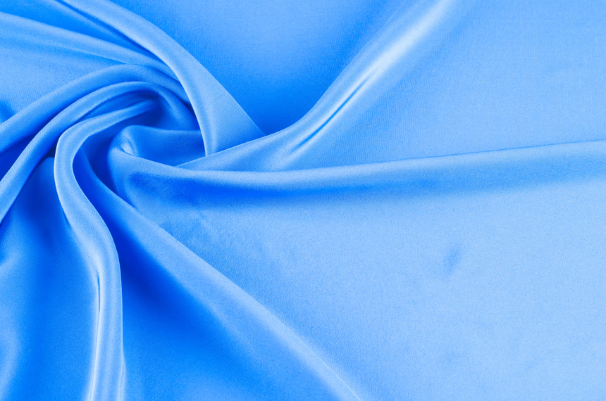 一块浅蓝色的打开织物图纺织丝绸质感纯色背景