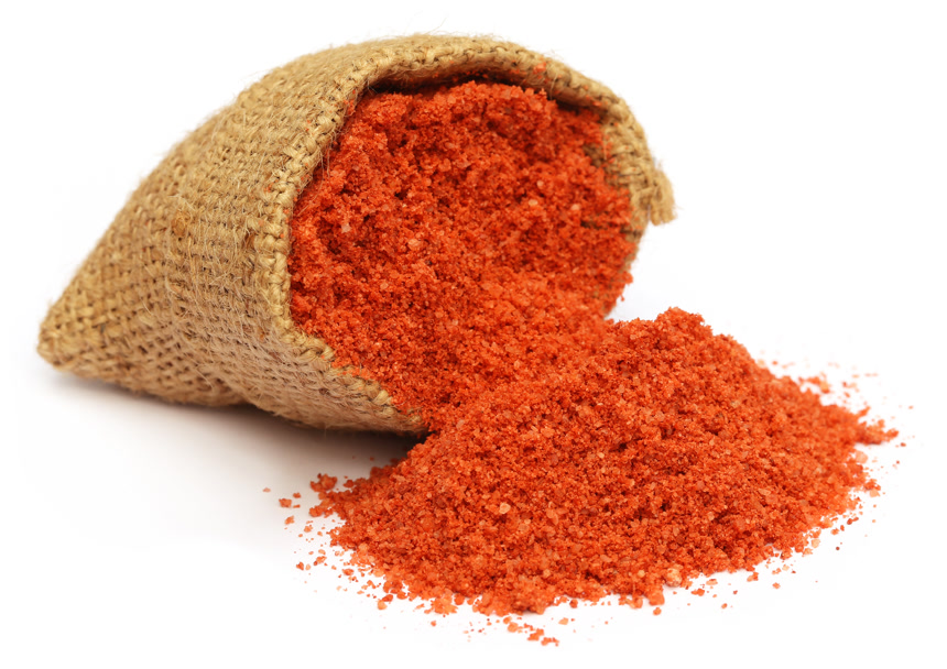 稀的钾肥一部分散落在白板上一部分在布袋子里一部分