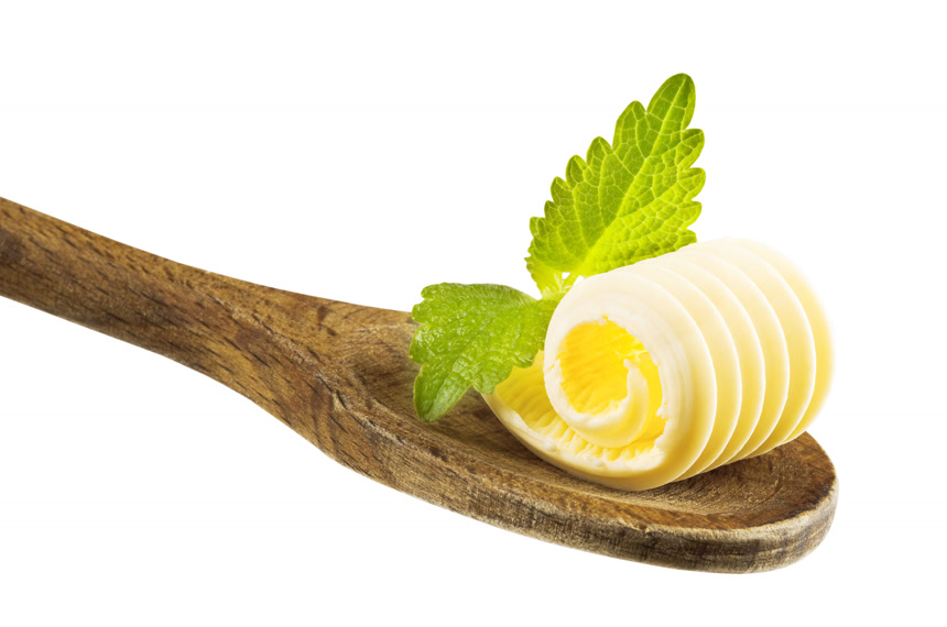 黄油卷在木勺上广告宣传白底图