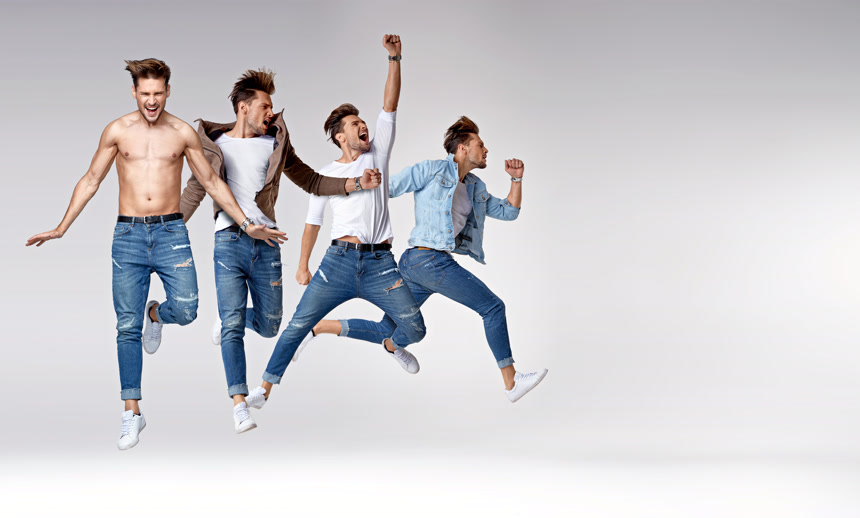 跳跃的男模特牛仔裤产品服装广告创意壁纸