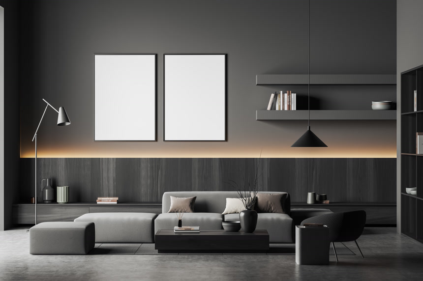 黑暗的客厅内部有沙发和扶手椅，有花瓶和书籍的咖啡桌，抽屉，架子和有背光的抽屉，灰色混凝土地板上的地毯。两张模拟海报，3D渲染