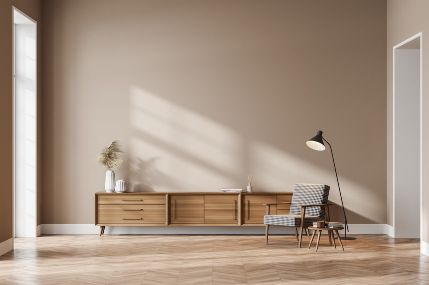 客厅内部有舒适的扶手椅餐具柜橡木地板舒适休息区室内设计