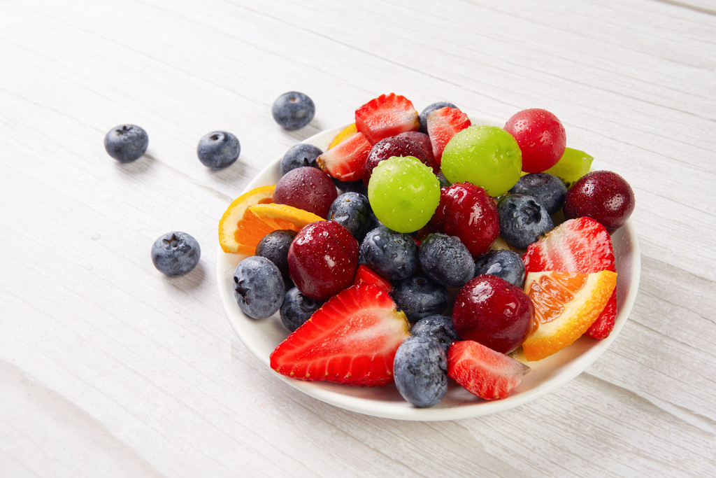 夏季水果拼盘美食背景图片