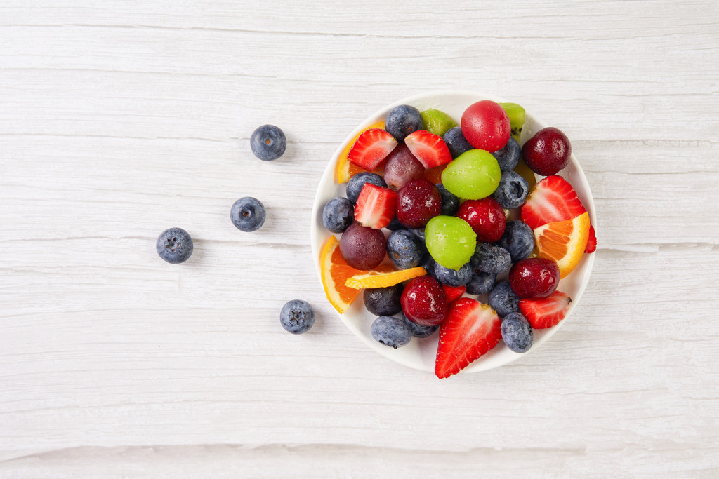 夏季水果拼盘美食背景图片