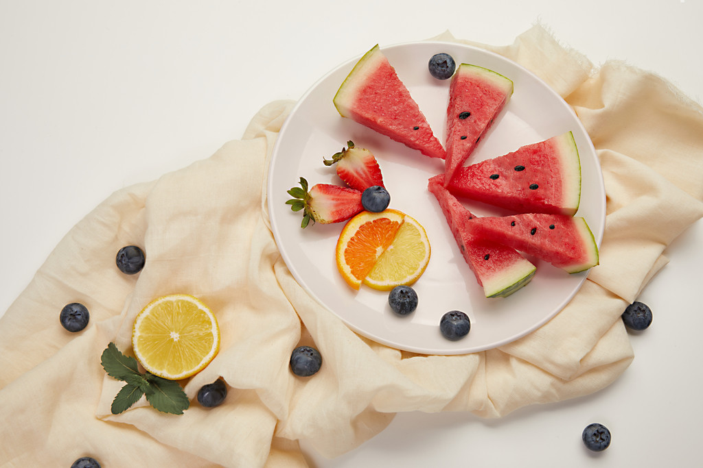 文艺小清新水果拼盘背景图片