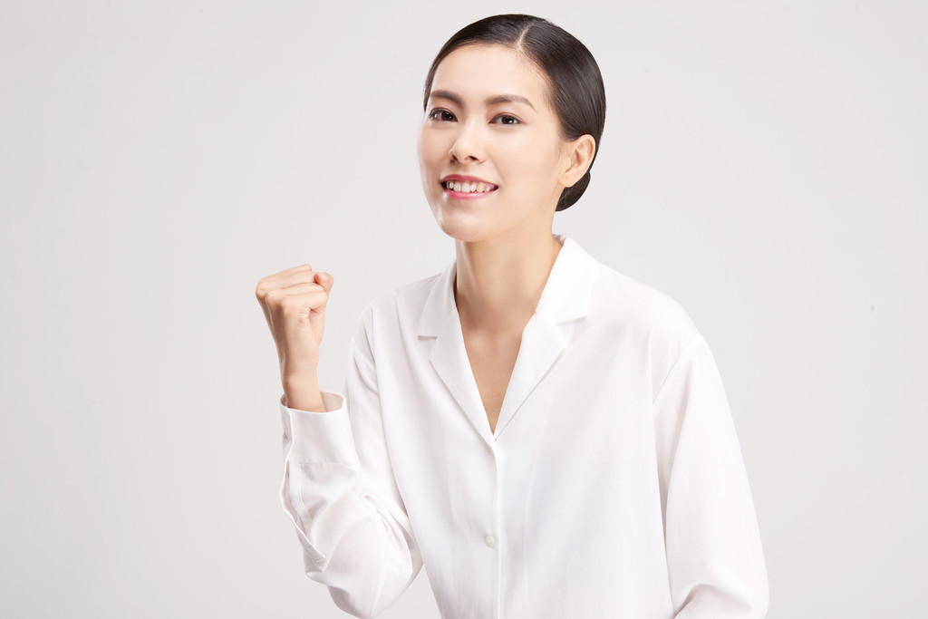 商务女性胜利握拳图片