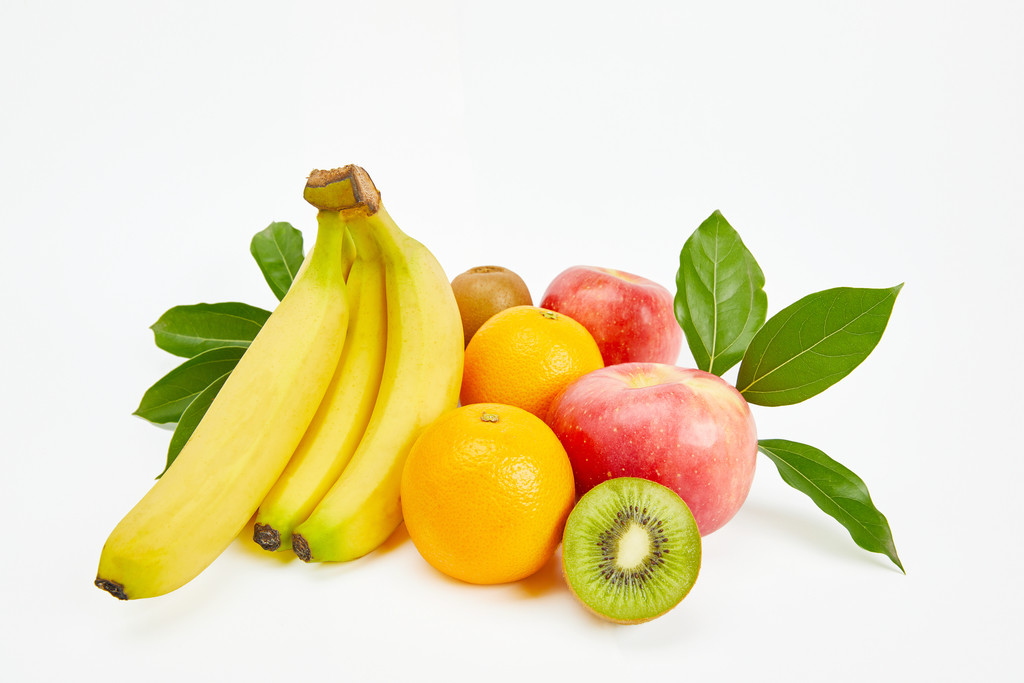 白底果蔬堆放背景图片