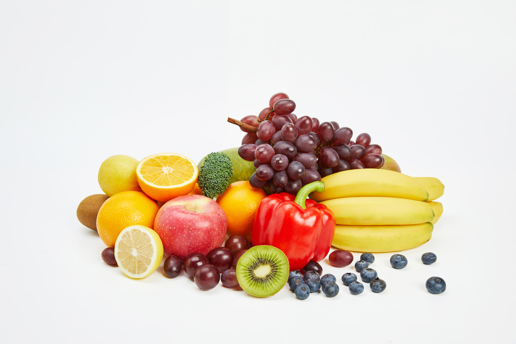 白底丰富水果果蔬背景图片