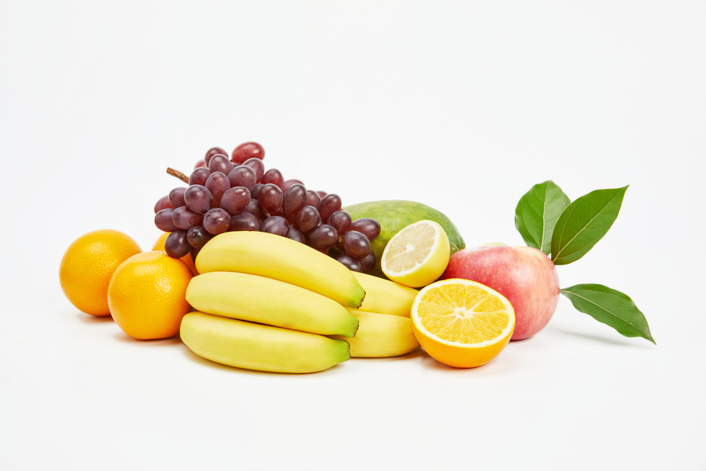 白底丰富水果果蔬背景图片