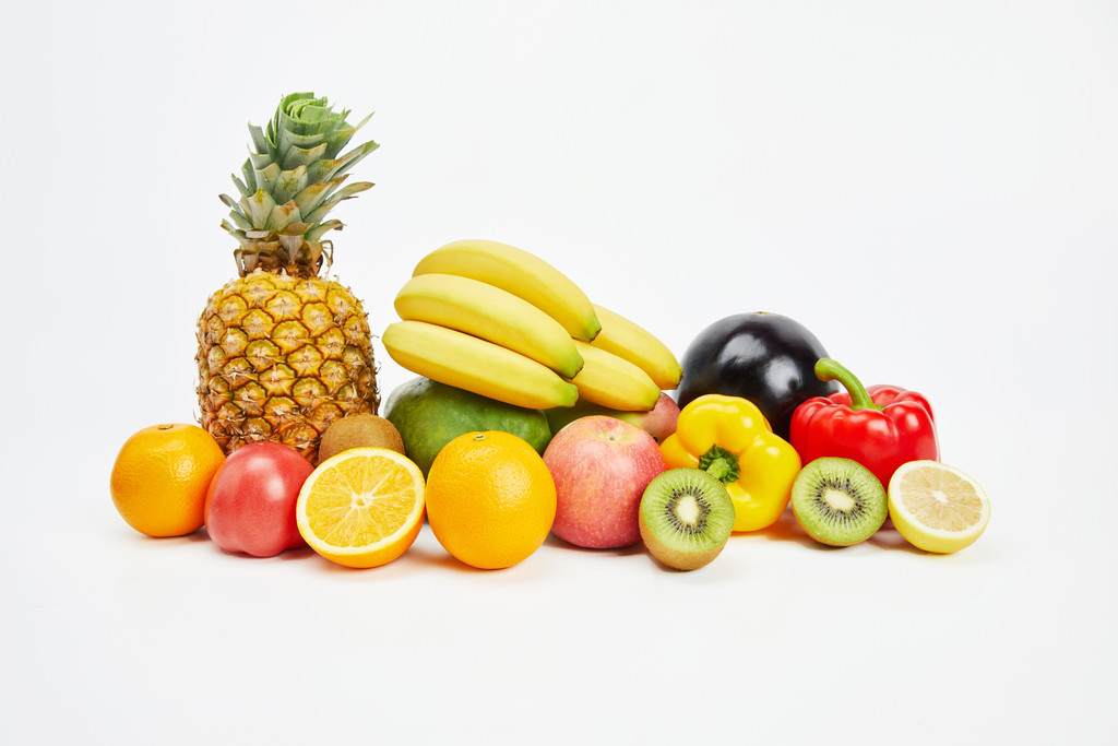 白底丰富水果果蔬背景图片