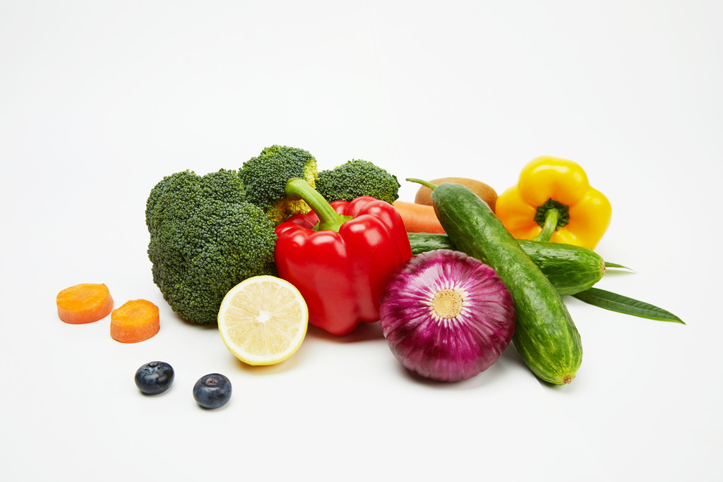 白底丰富水果果蔬背景图片