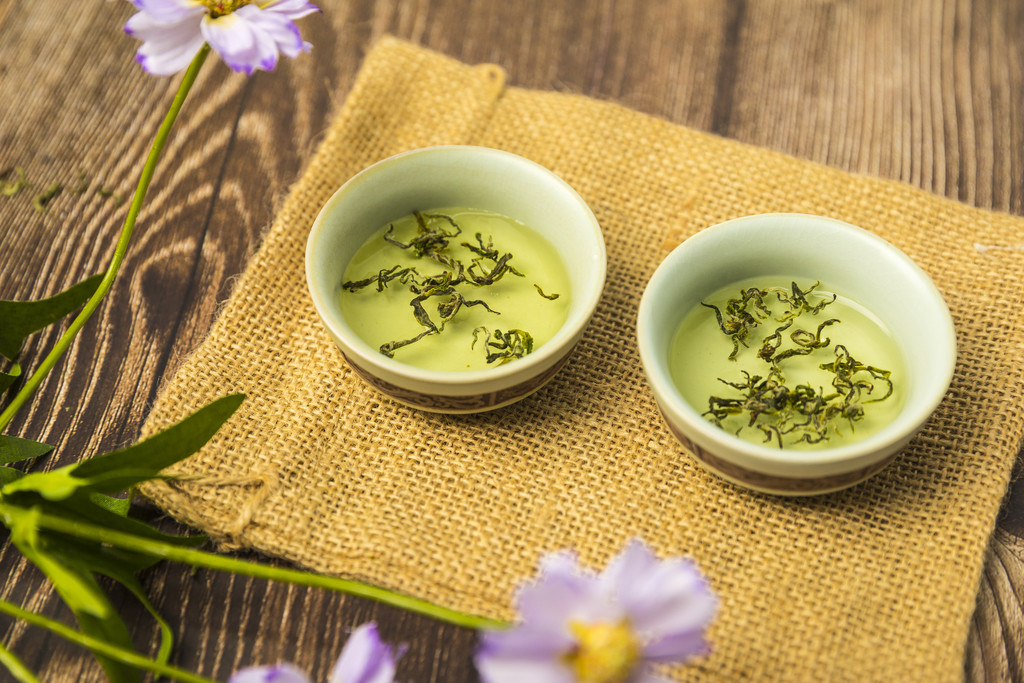 春季茶水绿茶背景图片