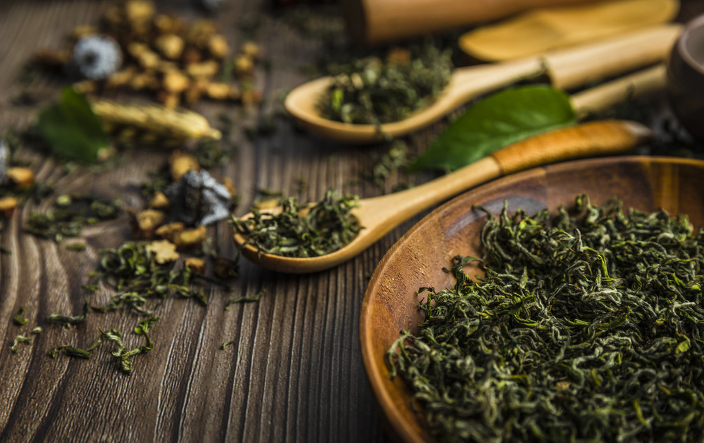 春季茶叶花茶背景图片