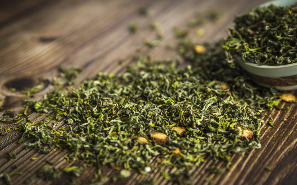 春季茶叶花茶背景图片