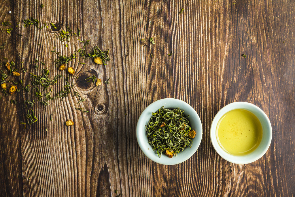 茶餐厅春季茶水绿茶背景图片