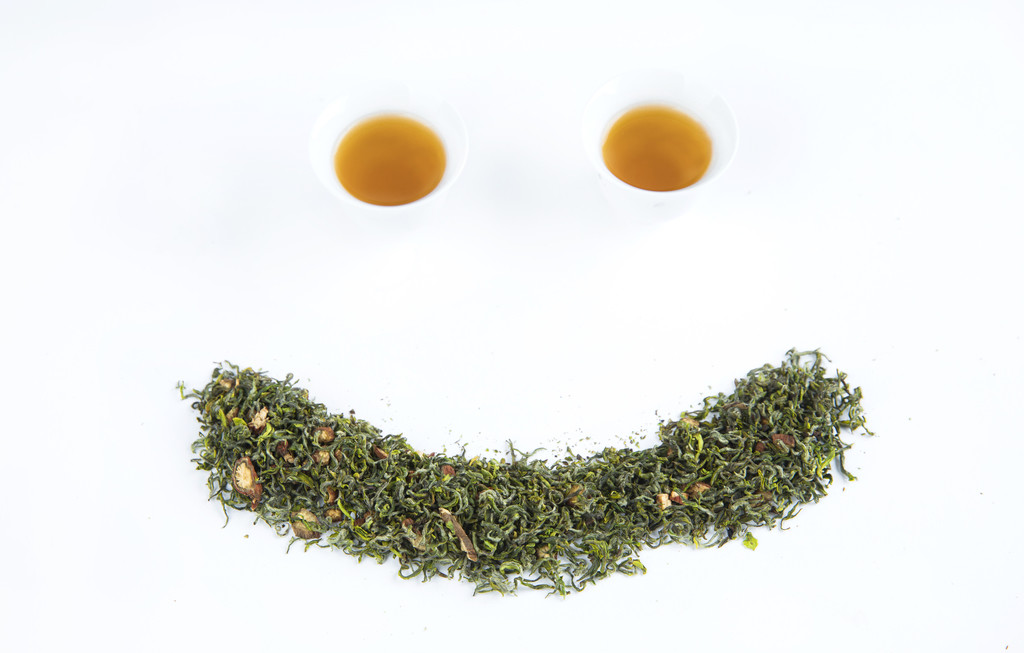 春季茶叶花茶背景图片