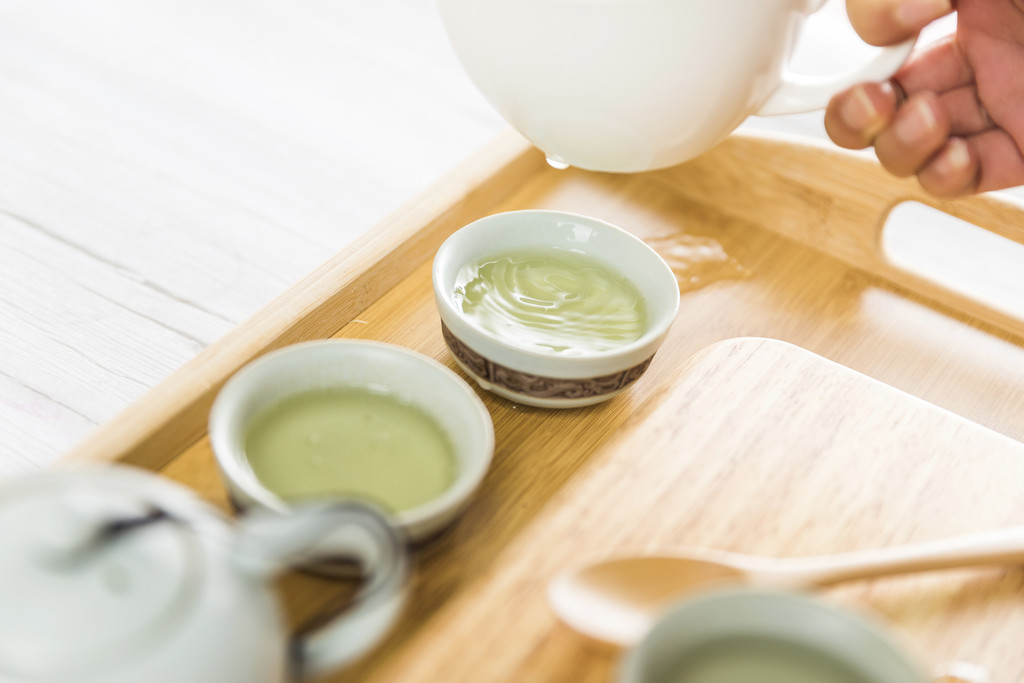 绿色春茶清新茶叶背景图片