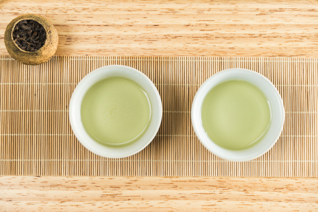 绿色春茶清新茶叶背景图片