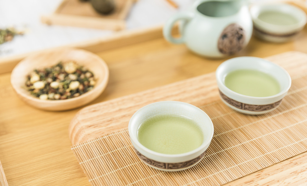 绿色春茶清新茶叶背景图片