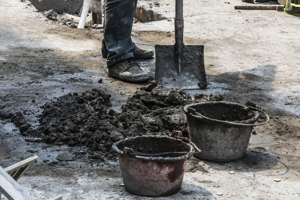 劳动工人水泥浆背景图片