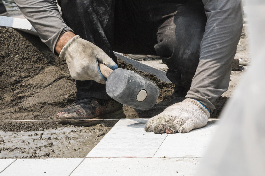 劳动工人水泥浆背景图片