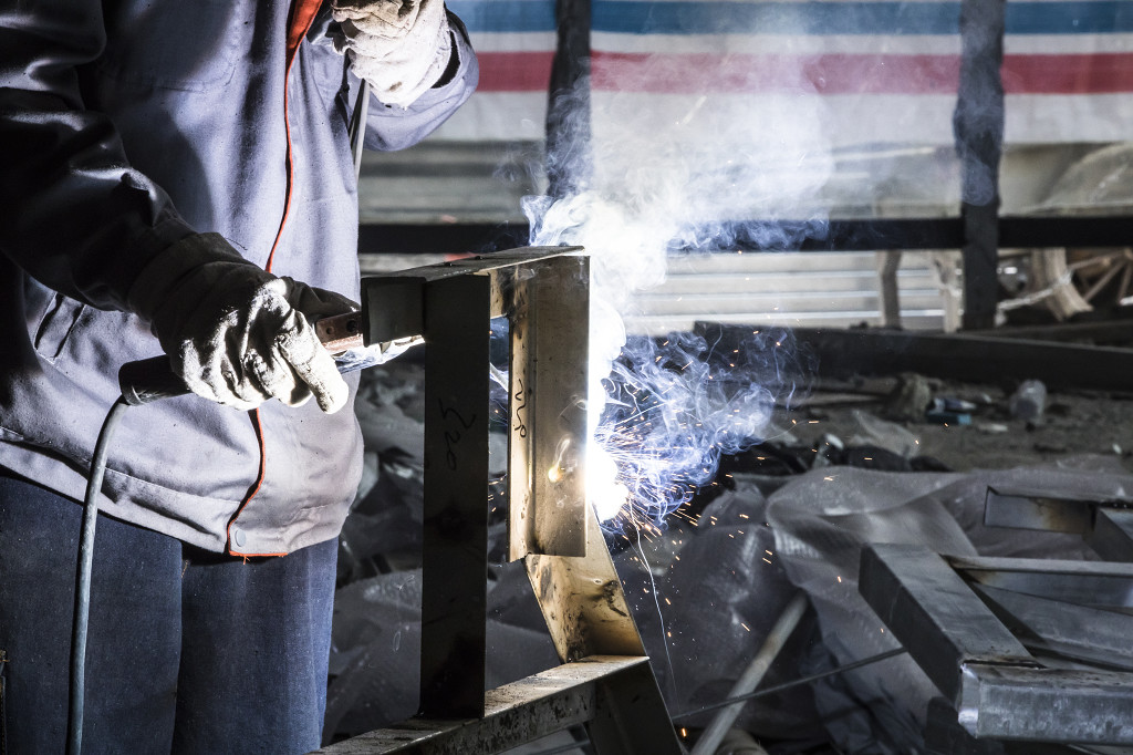 劳动节建筑工人忙碌工作背景图片