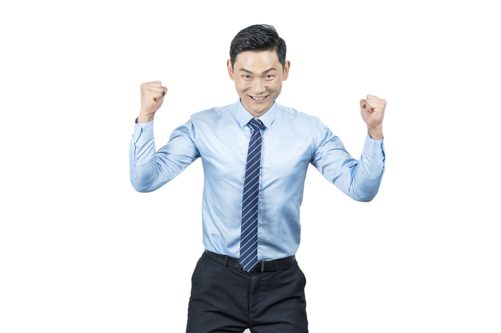 商务人士握拳胜利图片