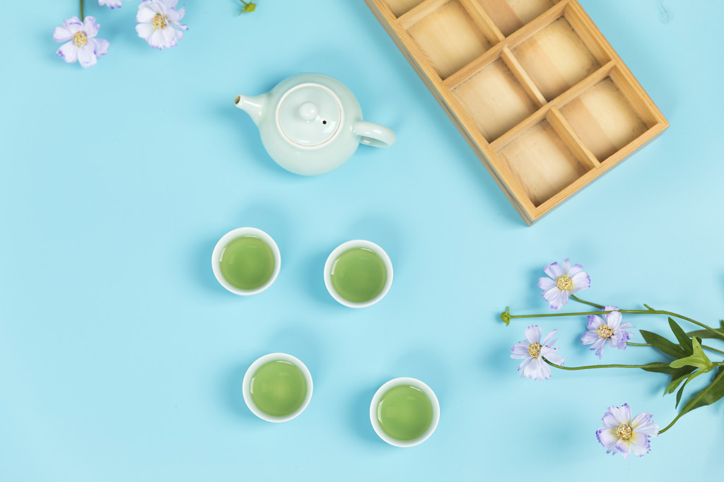 春季茶水绿茶背景图片