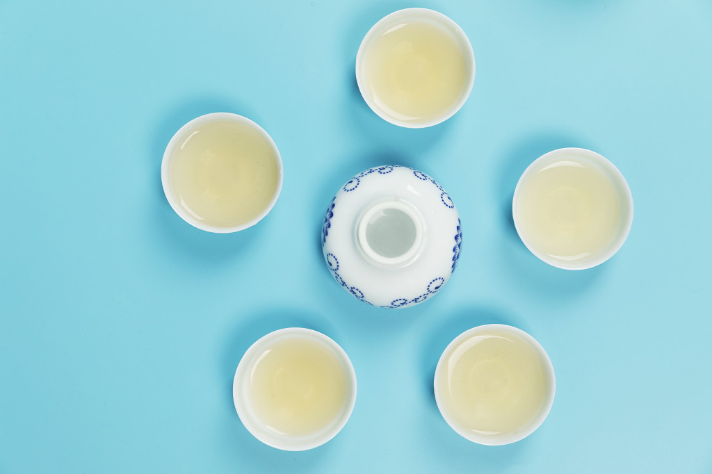 春季茶水绿茶背景图片