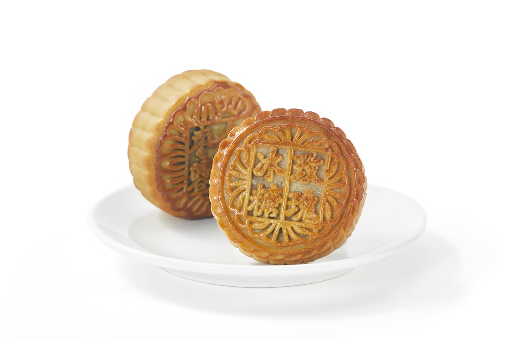 中秋月饼中秋元素中秋佳节迎中秋浓情中秋中秋节美味金色月饼白底图