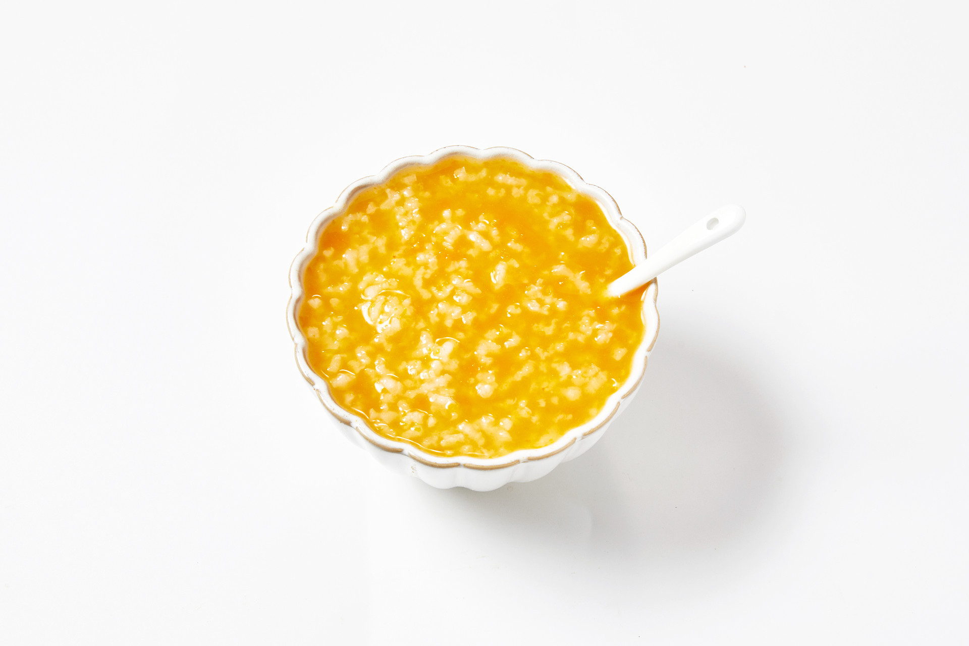 灰底白碗勺子汤勺南瓜粥大米粥大米南瓜粥