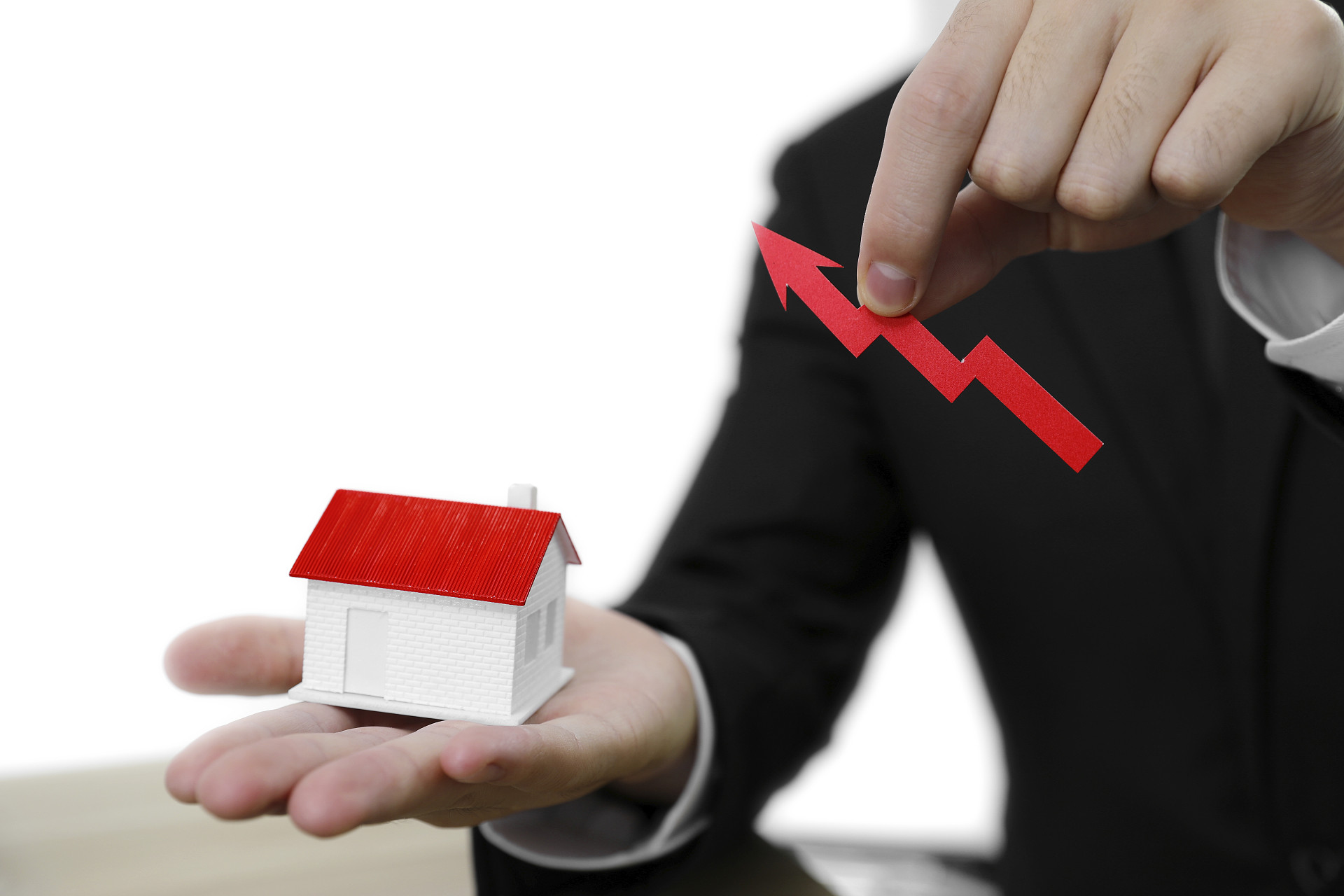 灰底商务人像购房手势房产投资房屋投资增长增值趋势