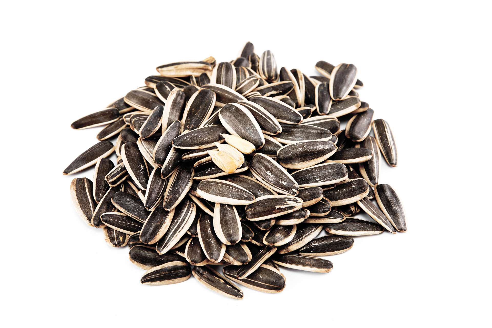 白底一堆瓜子散落瓜子散落坚果剥开瓜子黑色瓜子坚果