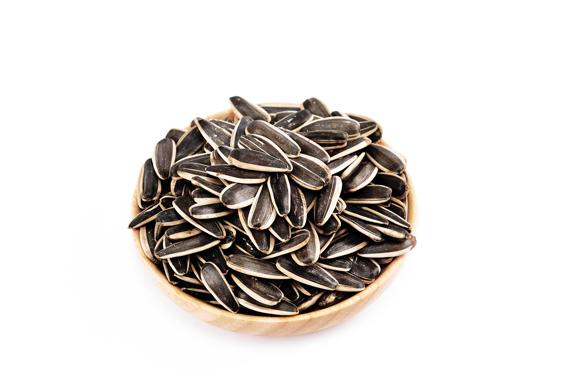 白底木盘一盘坚果一盘瓜子黑色瓜子坚果