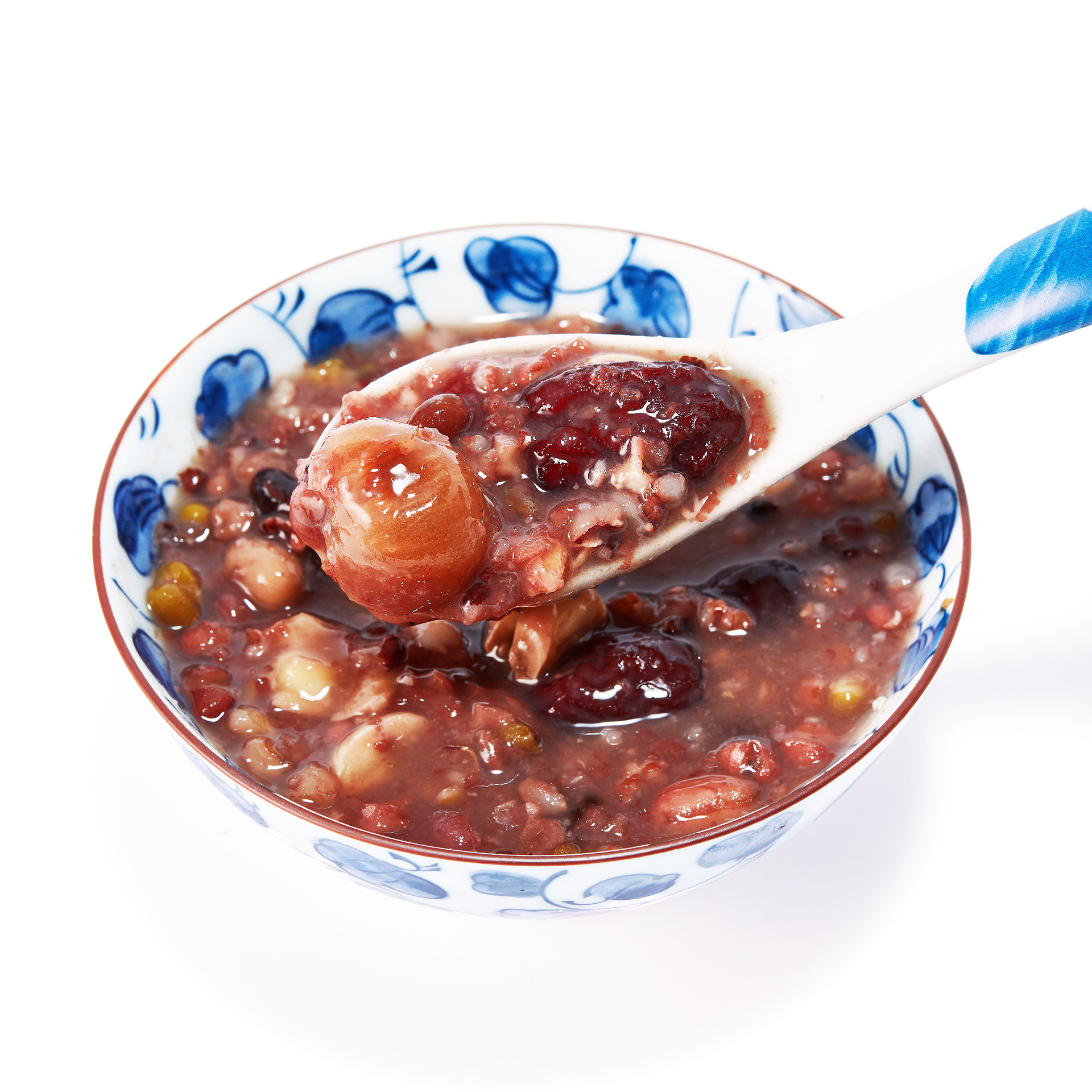 白底勺子瓷碗一碗腊八粥手拿勺子腊八节八宝粥