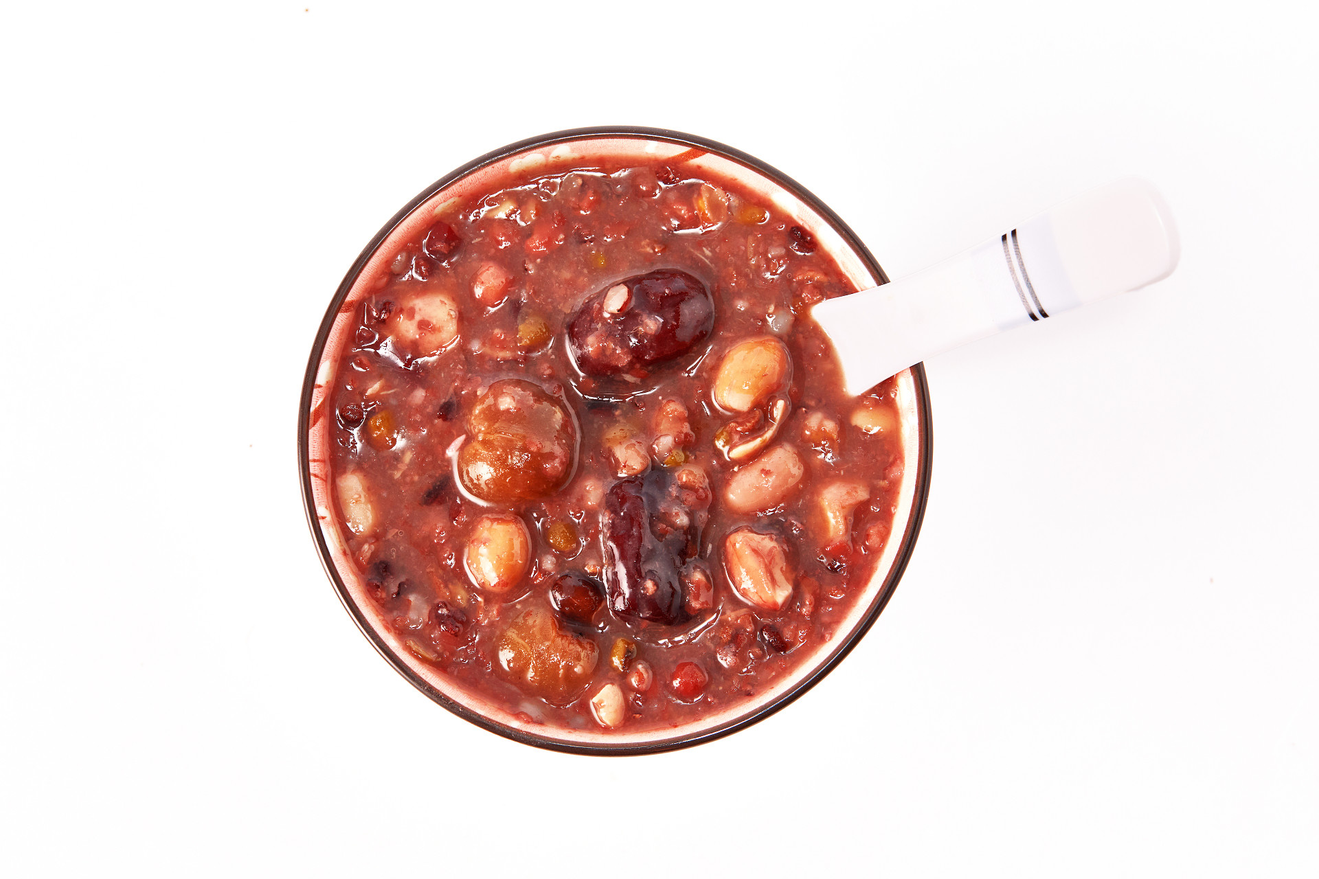 俯视图白底瓷碗勺子一碗腊八粥腊八节腊八粥八宝粥