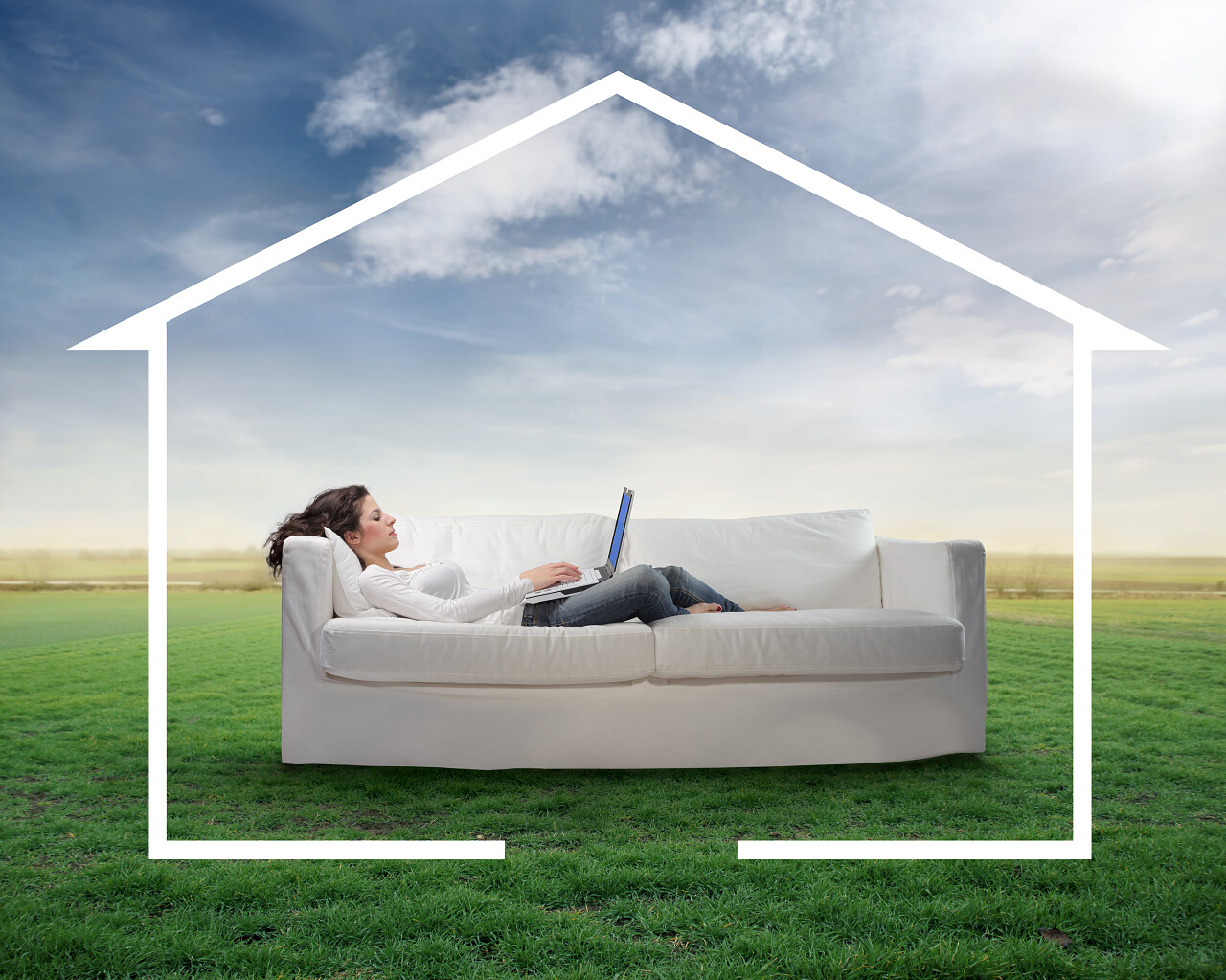 草原上立体线条房子里年轻女子躺在沙发上用笔记本电脑创意合成图