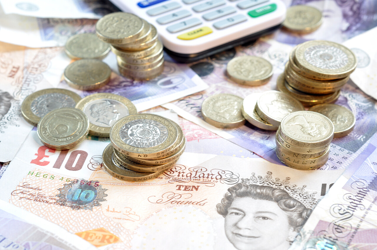 英镑纸币金币金币钱钱财产金融理财投资钞票